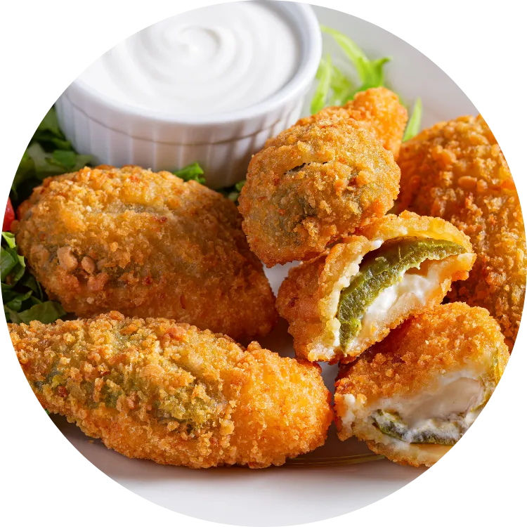Serving tray with assorted chicken wings and sauces, showcasing menu variety.